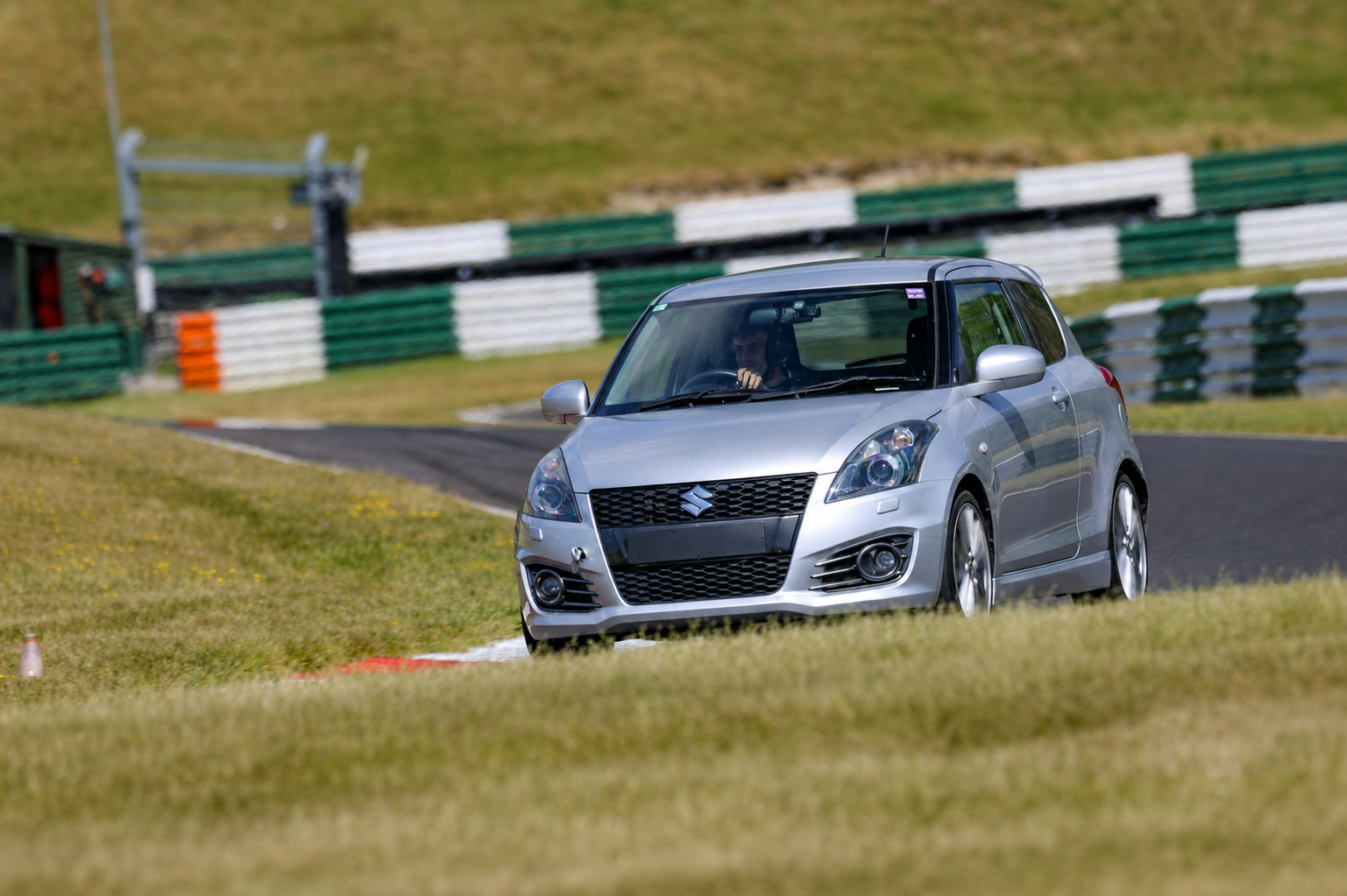 Suzuki Swift Sport and Mazda MX-5 at a UK circuit